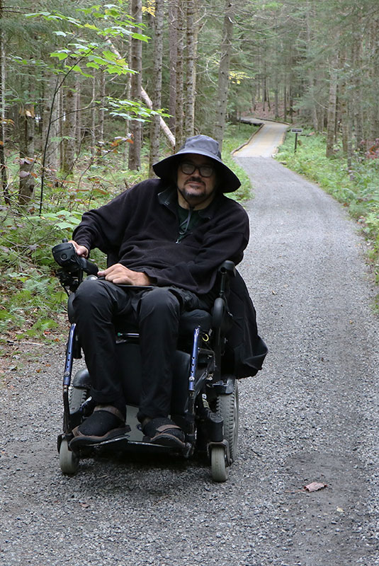 Jason Thurston in his motorized wheelchair.
